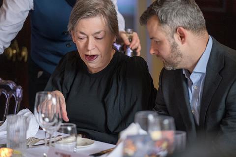 Photograph of Medco Registration solutions director Susan Brown and Insurance Fraud Enforcement Dept. City of London Police detective inspector Tom Hill in conversation at the roundtable.